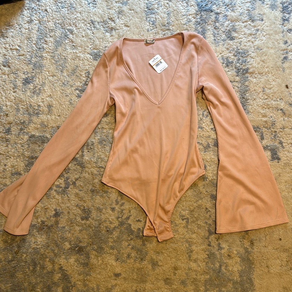 Light Pink bell sleeve Free People bodysuit size small